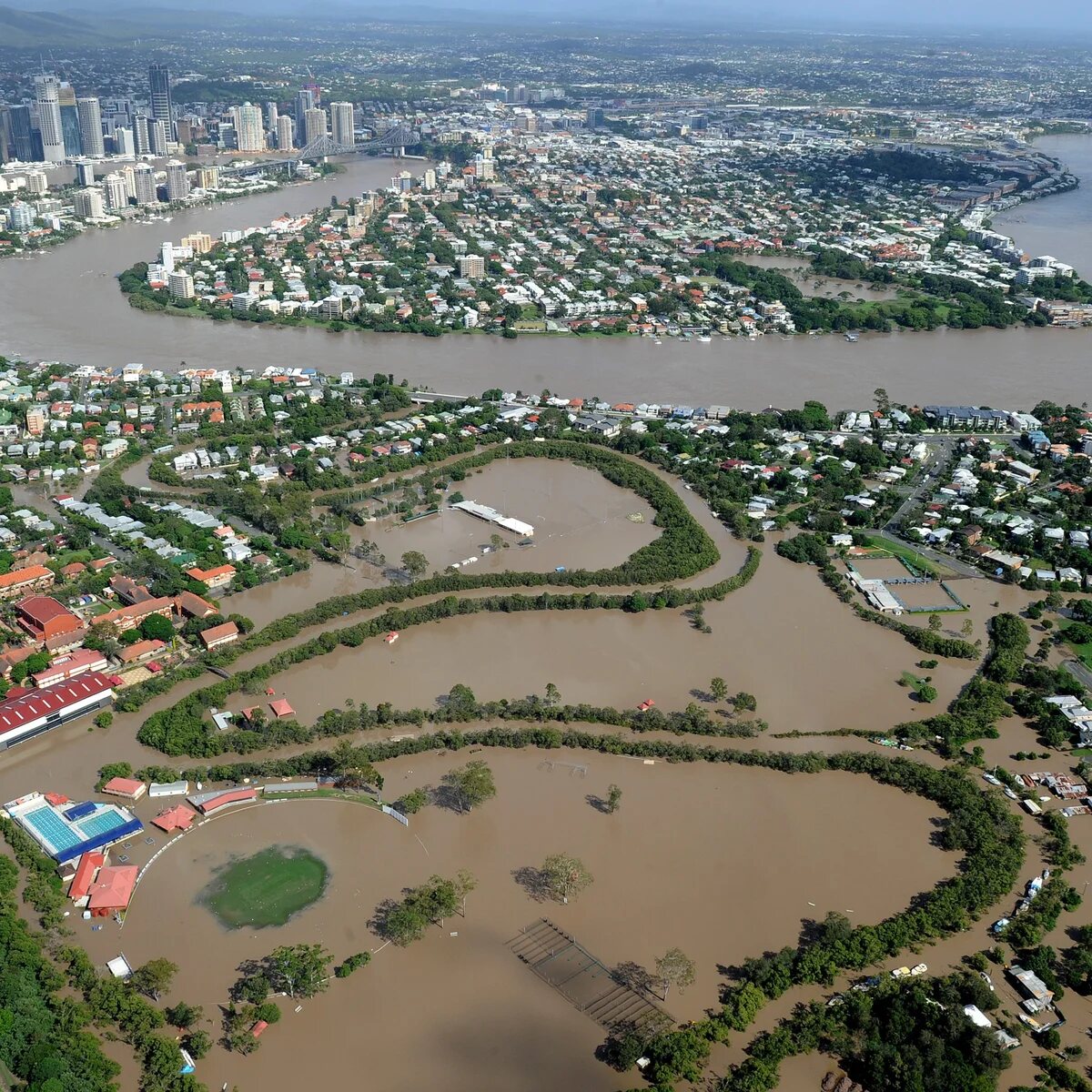 Aerial view of the 2011 Queensland floods inundating Brisbane suburbs along the river.