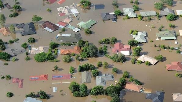 Inundated residential rooftops during the 2011 Queensland floods.